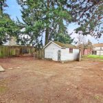 Situated on a large 6100 Sq Ft lot with alley access, the possibilities abound. 