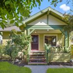Columbia City charm! 1914 craftsman bungalow on a private fairytale-like lot awaits her new proud owner.