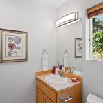 Your guests will appreciate the convenience of the day-lit main floor powder room, featuring…