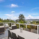 Step out onto the expansive 60' x 12' deck with a sleek glass railing, perfect for relaxing and hosting Seafair parties! 
