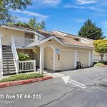 Embrace the tranquility, nestled on the hillside in this delightful end unit condo. A peaceful retreat surrounded by stunning greenery, offering a perfect blend of nature and comfort.