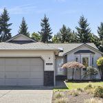 Welcoming front exterior with refreshed landscaping, graceful Japanese maple, and charming curb appeal in a quiet Auburn cul-de-sac.
