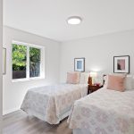 Cozy and inviting secondary bedroom, perfect for guests or shared use.