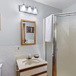 This private ¾ bath completes the lower-level primary suite—offering convenience and separation within a fully self-contained living space.
