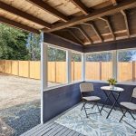 This covered porch adds everyday flexibility—rain or shine. With power in place, it’s ready for a second refrigerator, freezer, or casual work area. It’s also a great spot to pause, putter, or enjoy a quiet moment outdoors—sheltered from the elements.