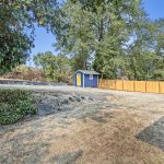 This terraced backyard combines privacy, function, and potential. A new fence spans the entire north lot line, while stonework, mature trees, and cleared upper grounds set the stage for gardening, play, or future projects. The freshly renovated shed adds charm and utility.