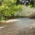 With limited street parking due to protected bike lanes, this separately deeded lot offers rare off-street convenience. Generously sized and tucked behind mature trees, it provides easy access, long-term flexibility, and everyday peace of mind—especially for multi-household living.