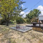 This is why the lot matters: enough open ground between deck, patio and shed for the backyard to feel like real territory—not leftover space.