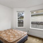 South- and west-facing windows bring light from two directions, with an outlook toward the backyard.