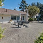 Step outside to a sunny gathering area with room to sit, visit, and extend clubhouse get-togethers into the open air.