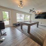The clubhouse game room gives residents a separate place to shoot pool, watch the game, or just hang out.