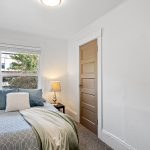 The second bedroom faces north toward E Columbia and includes a walk-in closet.