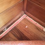 OAK HARDWOOD BELOW: A peek beneath the carpeting reveals oak hardwood flooring, confirmed in the main-floor living room, hallways, hallway closets, and bedroom.